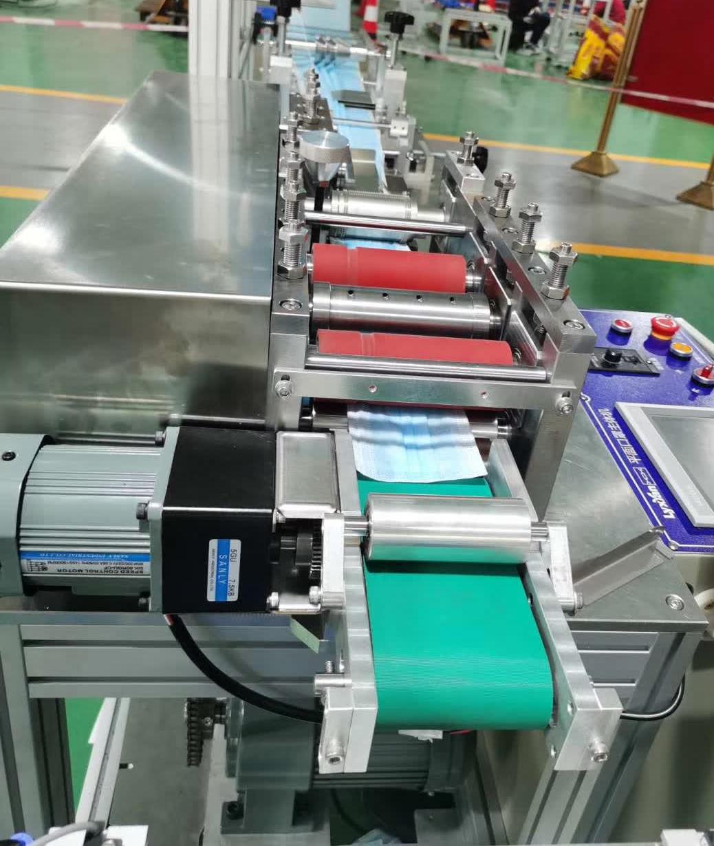 口罩生產(chǎn)流水線.jpg 口罩生產(chǎn)流水線.jpg